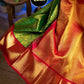 Green and Copper Zari Woven Banarasi Silk Saree for Women – Elegant Traditional Silk Saree with Red Border & Blouse Piece for Wedding & Festive Wear